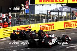 Max Verstappen (NLD) Red Bull Racing RB20 and Nico Hulkenberg (GER) Haas VF-24. 25.05.2024. Formula 1 World Championship, Rd 8, Monaco Grand Prix, Monte Carlo, Monaco, Qualifying Day.
