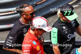 Charles Leclerc (MON) Ferrari and Lewis Hamilton (GBR) Mercedes AMG F1 on the drivers' parade. 26.05.2024. Formula 1 World Championship, Rd 8, Monaco Grand Prix, Monte Carlo, Monaco, Race Day.