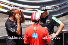 (L to R): Lewis Hamilton (GBR) Mercedes AMG F1; Charles Leclerc (MON) Ferrari; and Valtteri Bottas (FIN) Sauber, on the drivers' parade. 26.05.2024. Formula 1 World Championship, Rd 8, Monaco Grand Prix, Monte Carlo, Monaco, Race Day.