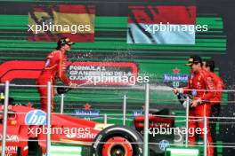 (L to R): Race winner Carlos Sainz Jr (ESP) Ferrari celebrates on the podium with third placed team mate Charles Leclerc (MON) Ferrari and Riccardo Adami (ITA) Ferrari Race Engineer. 27.10.2024. Formula 1 World Championship, Rd 20, Mexican Grand Prix, Mexico City, Mexico, Race Day.