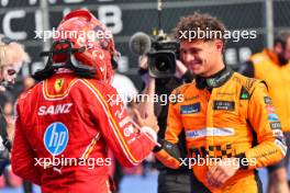 (L to R): Race winner Carlos Sainz Jr (ESP) Ferrari celebrates in parc ferme with second placed Lando Norris (GBR) McLaren. 27.10.2024. Formula 1 World Championship, Rd 20, Mexican Grand Prix, Mexico City, Mexico, Race Day.