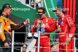 The podium (L to R): Lando Norris (GBR) McLaren, second; Charles Leclerc (MON) Ferrari, third; Carlos Sainz Jr (ESP) Ferrari, race winner. 27.10.2024. Formula 1 World Championship, Rd 20, Mexican Grand Prix, Mexico City, Mexico, Race Day.