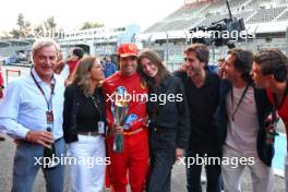 Carlos Sainz Jr (ESP) Ferrari celebrates with his father Carlos Sainz (ESP); his mother Reyes Vázquez de Castro (ESP); girlfriend Rebecca Donaldson (GBR); and friends. 27.10.2024. Formula 1 World Championship, Rd 20, Mexican Grand Prix, Mexico City, Mexico, Race Day.