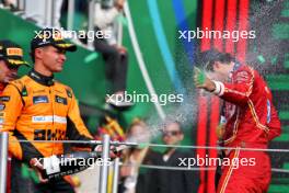 (L to R): Lando Norris (GBR) McLaren celebrates his second position on the podium with race winner Carlos Sainz Jr (ESP) Ferrari. 27.10.2024. Formula 1 World Championship, Rd 20, Mexican Grand Prix, Mexico City, Mexico, Race Day.