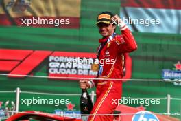 Race winner Carlos Sainz Jr (ESP) Ferrari SF-24 celebrates on the podium. 27.10.2024. Formula 1 World Championship, Rd 20, Mexican Grand Prix, Mexico City, Mexico, Race Day.