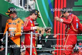 (L to R): Lando Norris (GBR) McLaren celebrates his second position on the podium with Charles Leclerc (MON) Ferrari and race winner Carlos Sainz Jr (ESP) Ferrari. 27.10.2024. Formula 1 World Championship, Rd 20, Mexican Grand Prix, Mexico City, Mexico, Race Day.