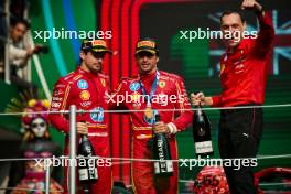 (L to R): Charles Leclerc (MON) Ferrari celebrates his third position on the podium with race winner Carlos Sainz Jr (ESP) Ferrari and Riccardo Adami (ITA) Ferrari Race Engineer. 27.10.2024. Formula 1 World Championship, Rd 20, Mexican Grand Prix, Mexico City, Mexico, Race Day.