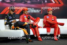 (L to R): Lando Norris (GBR) McLaren; Carlos Sainz Jr (ESP) Ferrari; and Charles Leclerc (MON) Ferrari, in the post race FIA Press Conference. 27.10.2024. Formula 1 World Championship, Rd 20, Mexican Grand Prix, Mexico City, Mexico, Race Day.