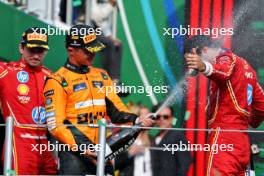 (L to R): Lando Norris (GBR) McLaren celebrates his second position on the podium with race winner Carlos Sainz Jr (ESP) Ferrari. 27.10.2024. Formula 1 World Championship, Rd 20, Mexican Grand Prix, Mexico City, Mexico, Race Day.