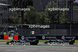 George Russell (GBR) Mercedes AMG F1 W15 and Lewis Hamilton (GBR) Mercedes AMG F1 W15 battle for position. 27.10.2024. Formula 1 World Championship, Rd 20, Mexican Grand Prix, Mexico City, Mexico, Race Day.