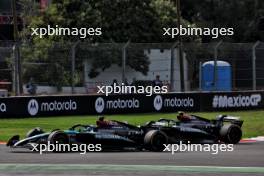 George Russell (GBR) Mercedes AMG F1 W15 and Lewis Hamilton (GBR) Mercedes AMG F1 W15 battle for position. 27.10.2024. Formula 1 World Championship, Rd 20, Mexican Grand Prix, Mexico City, Mexico, Race Day.