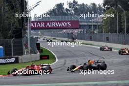 Carlos Sainz Jr (ESP) Ferrari SF-24 and Max Verstappen (NLD) Red Bull Racing RB20 battle for position. 27.10.2024. Formula 1 World Championship, Rd 20, Mexican Grand Prix, Mexico City, Mexico, Race Day.