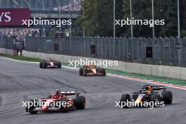 Carlos Sainz Jr (ESP) Ferrari SF-24 and Max Verstappen (NLD) Red Bull Racing RB20 battle for position. 27.10.2024. Formula 1 World Championship, Rd 20, Mexican Grand Prix, Mexico City, Mexico, Race Day.