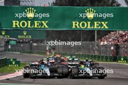 George Russell (GBR) Mercedes AMG F1 W15 and Lewis Hamilton (GBR) Mercedes AMG F1 W15 at the start of the race. 27.10.2024. Formula 1 World Championship, Rd 20, Mexican Grand Prix, Mexico City, Mexico, Race Day.