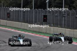 George Russell (GBR) Mercedes AMG F1 W15 and Lewis Hamilton (GBR) Mercedes AMG F1 W15 battle for position. 27.10.2024. Formula 1 World Championship, Rd 20, Mexican Grand Prix, Mexico City, Mexico, Race Day.