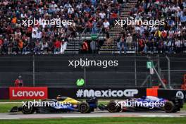 Liam Lawson (NZL) RB VCARB 01 and Franco Colapinto (ARG) Williams Racing FW46 battle for position, making contact. 27.10.2024. Formula 1 World Championship, Rd 20, Mexican Grand Prix, Mexico City, Mexico, Race Day.