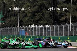 Esteban Ocon (FRA) Alpine F1 Team A524 and Zhou Guanyu (CHN) Sauber C44 battle for position. 27.10.2024. Formula 1 World Championship, Rd 20, Mexican Grand Prix, Mexico City, Mexico, Race Day.