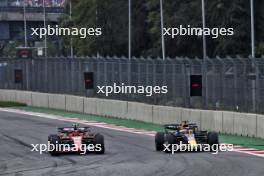 Carlos Sainz Jr (ESP) Ferrari SF-24 and Max Verstappen (NLD) Red Bull Racing RB20 battle for position. 27.10.2024. Formula 1 World Championship, Rd 20, Mexican Grand Prix, Mexico City, Mexico, Race Day.