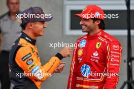 (L to R): Lando Norris (GBR) McLaren with pole sitter Carlos Sainz Jr (ESP) Ferrari in qualifying parc ferme. 26.10.2024. Formula 1 World Championship, Rd 20, Mexican Grand Prix, Mexico City, Mexico, Qualifying Day.