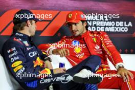 (L to R): Max Verstappen (NLD) Red Bull Racing; and Carlos Sainz Jr (ESP) Ferrari; in the post qualifying FIA Press Conference. 26.10.2024. Formula 1 World Championship, Rd 20, Mexican Grand Prix, Mexico City, Mexico, Qualifying Day.