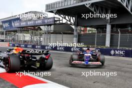 Liam Lawson (NZL) RB VCARB 01 spins, and is passed by Max Verstappen (NLD) Red Bull Racing RB20. 26.10.2024. Formula 1 World Championship, Rd 20, Mexican Grand Prix, Mexico City, Mexico, Qualifying Day.