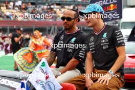 (L to R): Lewis Hamilton (GBR) Mercedes AMG F1 and George Russell (GBR) Mercedes AMG F1 on the drivers' parade. 27.10.2024. Formula 1 World Championship, Rd 20, Mexican Grand Prix, Mexico City, Mexico, Race Day.