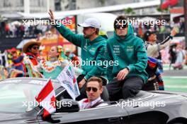 (L to R): Fernando Alonso (ESP) Aston Martin F1 Team and lspt on the drivers' parade. 27.10.2024. Formula 1 World Championship, Rd 20, Mexican Grand Prix, Mexico City, Mexico, Race Day.