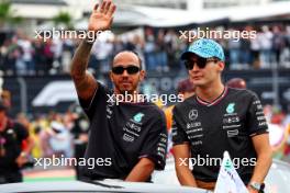 (L to R): Lewis Hamilton (GBR) Mercedes AMG F1 and George Russell (GBR) Mercedes AMG F1 on the drivers' parade. 27.10.2024. Formula 1 World Championship, Rd 20, Mexican Grand Prix, Mexico City, Mexico, Race Day.