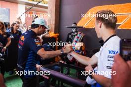 (L to R): Sergio Perez (MEX) Red Bull Racing with Liam Lawson (NZL) RB. 24.10.2024. Formula 1 World Championship, Rd 20, Mexican Grand Prix, Mexico City, Mexico, Preparation Day.