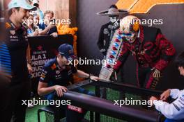 (L to R): Sergio Perez (MEX) Red Bull Racing; Max Verstappen (NLD) Red Bull Racing; and Yuki Tsunoda (JPN) RB. 24.10.2024. Formula 1 World Championship, Rd 20, Mexican Grand Prix, Mexico City, Mexico, Preparation Day.