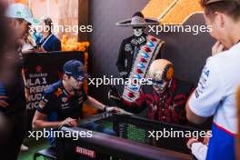 (L to R): Sergio Perez (MEX) Red Bull Racing; Max Verstappen (NLD) Red Bull Racing; Yuki Tsunoda (JPN) RB; and Liam Lawson (NZL) RB. 24.10.2024. Formula 1 World Championship, Rd 20, Mexican Grand Prix, Mexico City, Mexico, Preparation Day.