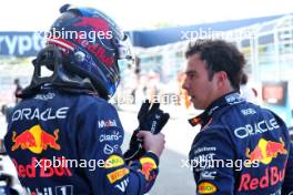 (L to R): Max Verstappen (NLD) Red Bull Racing with team mate Sergio Perez (MEX) Red Bull Racing in Sprint qualifying parc ferme. 03.05.2024. Formula 1 World Championship, Rd 6, Miami Grand Prix, Miami, Florida, USA, Sprint Qualifying Day.