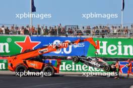 The Haas VF-24 of Nico Hulkenberg (GER) Haas F1 Team is recovered after he crashed in the second practice session. 23.08.2024. Formula 1 World Championship, Rd 15, Dutch Grand Prix, Zandvoort, Netherlands, Practice Day.