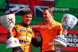 (L to R): Race winner Lando Norris (GBR) McLaren celebrates with William Joseph (GBR) McLaren Race Engineer on the podium. 25.08.2024. Formula 1 World Championship, Rd 15, Dutch Grand Prix, Zandvoort, Netherlands, Race Day.