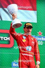 Charles Leclerc (MON) Ferrari celebrates his third position on the podium. 25.08.2024. Formula 1 World Championship, Rd 15, Dutch Grand Prix, Zandvoort, Netherlands, Race Day.