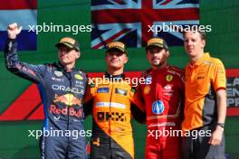 The podium (L to R): Max Verstappen (NLD) Red Bull Racing, second; Lando Norris (GBR) McLaren, race winner; Charles Leclerc (MON) Ferrari, third; William Joseph (GBR) McLaren Race Engineer. 25.08.2024. Formula 1 World Championship, Rd 15, Dutch Grand Prix, Zandvoort, Netherlands, Race Day.