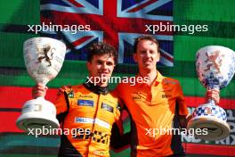 (L to R): Race winner Lando Norris (GBR) McLaren celebrates with William Joseph (GBR) McLaren Race Engineer on the podium. 25.08.2024. Formula 1 World Championship, Rd 15, Dutch Grand Prix, Zandvoort, Netherlands, Race Day.