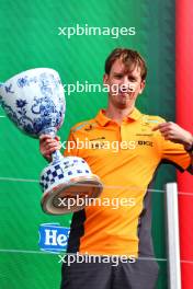 William Joseph (GBR) McLaren Race Engineer celebrates on the podium. 25.08.2024. Formula 1 World Championship, Rd 15, Dutch Grand Prix, Zandvoort, Netherlands, Race Day.