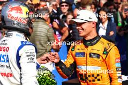 Race winner Lando Norris (GBR) McLaren in parc ferme (Right) celebrates with Daniel Ricciardo (AUS) RB. 25.08.2024. Formula 1 World Championship, Rd 15, Dutch Grand Prix, Zandvoort, Netherlands, Race Day.