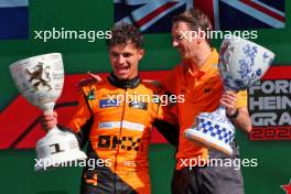 (L to R): Race winner Lando Norris (GBR) McLaren celebrates on the podium with William Joseph (GBR) McLaren Race Engineer. 25.08.2024. Formula 1 World Championship, Rd 15, Dutch Grand Prix, Zandvoort, Netherlands, Race Day.