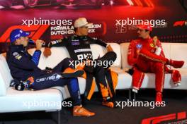 (L to R): Max Verstappen (NLD) Red Bull Racing; Lando Norris (GBR) McLaren; and Charles Leclerc (MON) Ferrari, in the post race FIA Press Conference. 25.08.2024. Formula 1 World Championship, Rd 15, Dutch Grand Prix, Zandvoort, Netherlands, Race Day.