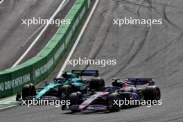 Pierre Gasly (FRA) Alpine F1 Team A524 and Fernando Alonso (ESP) Aston Martin F1 Team AMR24 battle for position. 25.08.2024. Formula 1 World Championship, Rd 15, Dutch Grand Prix, Zandvoort, Netherlands, Race Day.