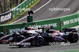 Nico Hulkenberg (GER) Haas VF-24 and Pierre Gasly (FRA) Alpine F1 Team A524 battle for position. 25.08.2024. Formula 1 World Championship, Rd 15, Dutch Grand Prix, Zandvoort, Netherlands, Race Day.