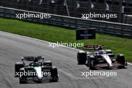 Lewis Hamilton (GBR) Mercedes AMG F1 W15 and Nico Hulkenberg (GER) Haas VF-24 battle for position. 25.08.2024. Formula 1 World Championship, Rd 15, Dutch Grand Prix, Zandvoort, Netherlands, Race Day.