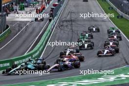 Fernando Alonso (ESP) Aston Martin F1 Team AMR24 leads Pierre Gasly (FRA) Alpine F1 Team A524 at the start of the race. 25.08.2024. Formula 1 World Championship, Rd 15, Dutch Grand Prix, Zandvoort, Netherlands, Race Day.