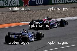 Esteban Ocon (FRA) Alpine F1 Team A524 and Alexander Albon (THA) Williams Racing FW46 battle for position. 25.08.2024. Formula 1 World Championship, Rd 15, Dutch Grand Prix, Zandvoort, Netherlands, Race Day.