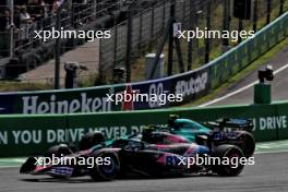 Pierre Gasly (FRA) Alpine F1 Team A524 and Fernando Alonso (ESP) Aston Martin F1 Team AMR24 battle for position. 25.08.2024. Formula 1 World Championship, Rd 15, Dutch Grand Prix, Zandvoort, Netherlands, Race Day.