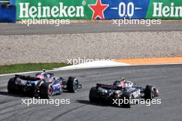 Nico Hulkenberg (GER) Haas VF-24 and Pierre Gasly (FRA) Alpine F1 Team A524 battle for position. 25.08.2024. Formula 1 World Championship, Rd 15, Dutch Grand Prix, Zandvoort, Netherlands, Race Day.