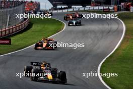 Max Verstappen (NLD) Red Bull Racing RB20 leads at the start of the race. 25.08.2024. Formula 1 World Championship, Rd 15, Dutch Grand Prix, Zandvoort, Netherlands, Race Day.