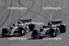 Nico Hulkenberg (GER) Haas VF-24 and Pierre Gasly (FRA) Alpine F1 Team A524 battle for position. 25.08.2024. Formula 1 World Championship, Rd 15, Dutch Grand Prix, Zandvoort, Netherlands, Race Day.